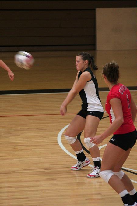 Kacie Ritter, junior, returns a serve in a match against Lyon College.  - Photo by Kristi McMurry Woody