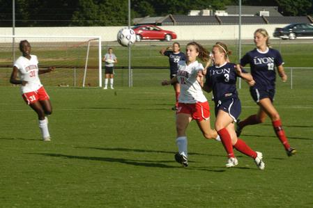 Steffi King, freshman, runs for the ball in an attempt to pass it to her teammate during the game against Lyon College. - Photo by Sarah Palmer Goff