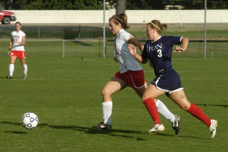 Steffi King, freshman, outruns her Lyon College opponent for the ball.  - Photo by Sarah Palmer Goff