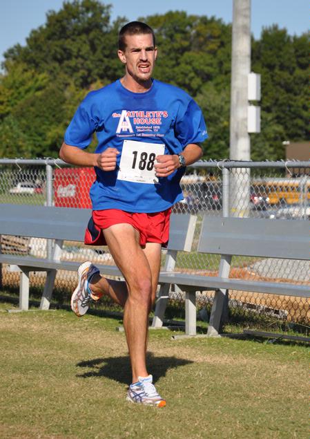Former Union cross country standout John Fox wins Union Cross Country Invitational individual title as an unaffiliated runner. - Photo by Uncredited