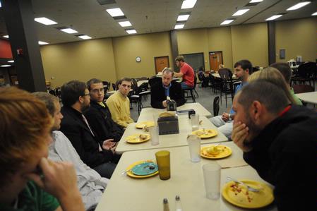Danny Akin, president of Southeastern Baptist Theological Seminary, talks with students from Union over breakfast who are interested in going to Southeastern. - Photo by Morris Abernathy