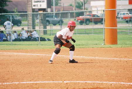 Megan Quarry of Decatur Ala. thinks better of going to second base after taking her lead from first during the 2003 NAIA Softball World Series. - Photo by Steven Aldridge