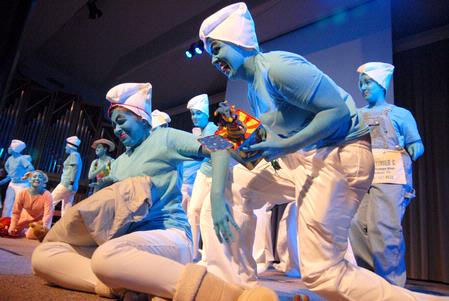 The ladies of Chi Omega perform their large group act, a skit about the Smurfs, during All-Sing 2009. - Photo by Kristi McMurry Woody