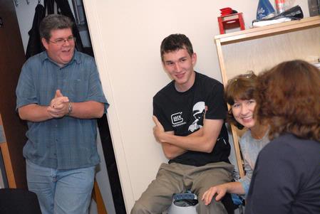 Kevin Scalf (left) shares a laugh with his son, Matt Scalf, junior computer science major, and his sister-in-law, Lynne Scott, during family weekend. - Photo by Kristi McMurry Woody