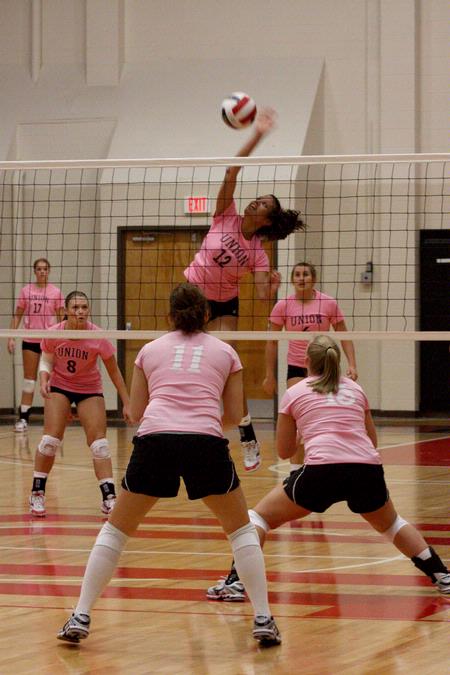 Marcela Madeira junior goes up for the hit against Freed during the Lady Bulldog Volleyball vs. Freed Hardeman University game (ACS Dig Pink Night) on  October 13, 2009.  - Photo by Megan Bailey