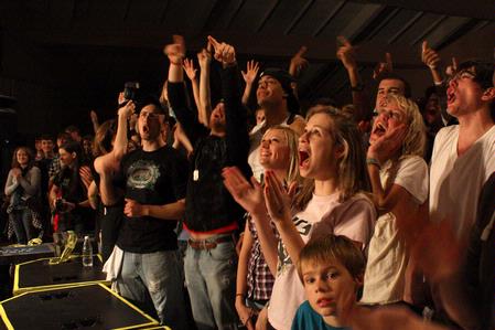The audience cheers as After Edmund performs during homecoming concert. - Photo by Megan Bailey