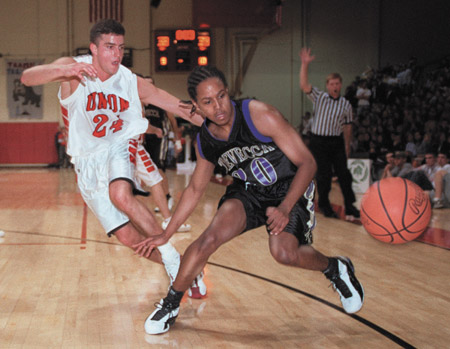 Will Harris, #24, defends against a Trevecca Nazarene player during the Homecoming game.  Union won 87-82. - Photo by Jim Veneman