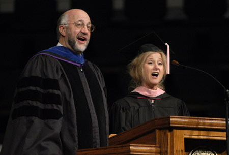 Dr. Richard Joiner, chair of the department of music, and Dianne Gatwood, associate professor of music, sing a duet entitled, <i>The Lord is My Light</i> at the August 2003 commencement exercises.  - Photo by Jim Veneman