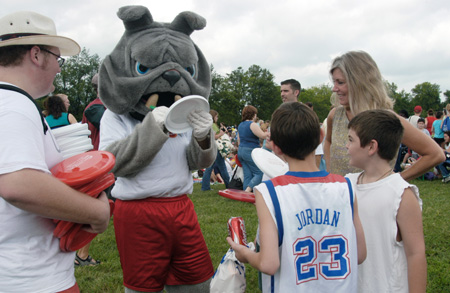 Buster signs autographs on a Union frisbee at a Steven Curtis Chapman Brown Bag concert sponsored by Union in Franklin, Tenn. - Photo by Jim Veneman