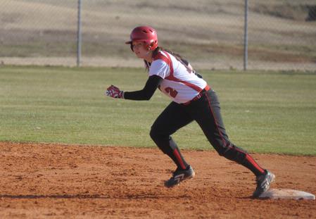 Amber Hayes, junior nursing major, rounds second base during a victorious double header against Missouri Baptist University - Photo by Morris Abernathy