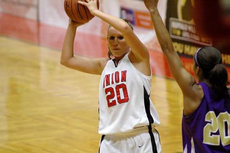 Kayla Hudson, junior political science major, looks for someone to pass to in Game 1 of the NAIA Women's Basketball National Tournament against Southwestern Assemblies of God University. The Lady Bulldogs won 86-47. - Photo by Beth Spain