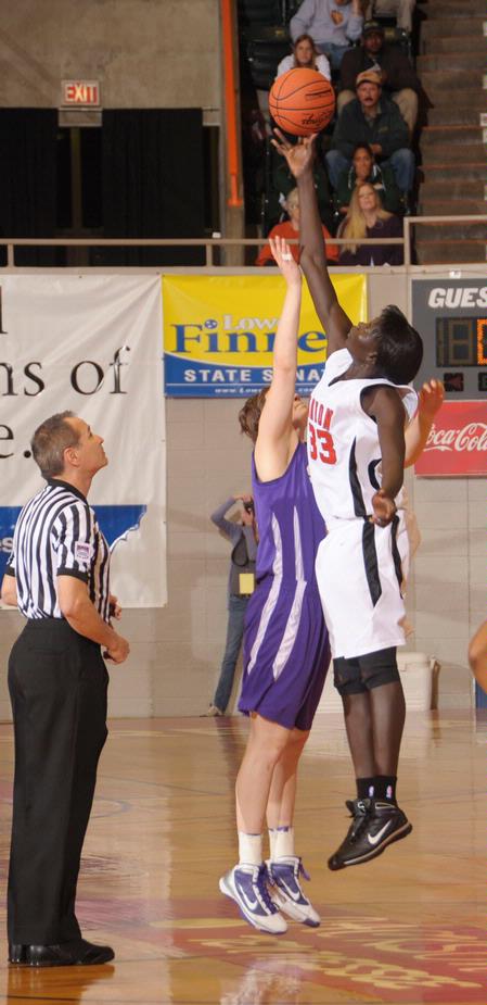 Zeinab Chan, junior history major, goes up for the ball to start Game 1 of the NAIA Women's Basketball National Tournament against Southwestern Assemblies of God University. The Lady Bulldogs won 86-47. - Photo by Morris Abernathy