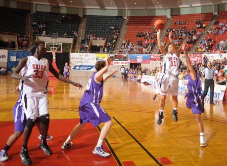 Kaitlin Dudley, senior physical education and health major, shoots the ball in Game 1 of the NAIA Women's Basketball National Tournament against Southwestern Assemblies of God University. The Lady Bulldogs won 86-47.  - Photo by Morris Abernathy