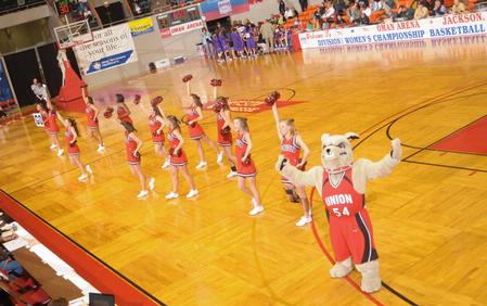 Buster the Bulldog helps the Union cheerleaders get the crowd excited in Game 1 of the NAIA Women's Basketball National Tournament against Southwestern Assemblies of God University. The Lady Bulldogs won 86-47.  - Photo by Morris Abernathy