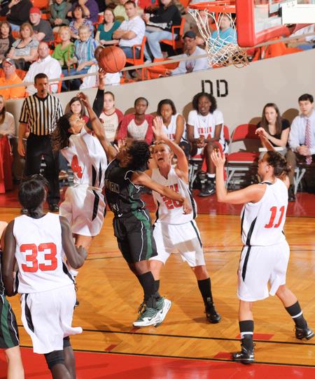 The Lady Bulldogs play offense in the Second Round game of the NAIA National Tournament against Southern Polytechnic State University. The Lady Bulldogs won 70-47. - Photo by Morris Abernathy
