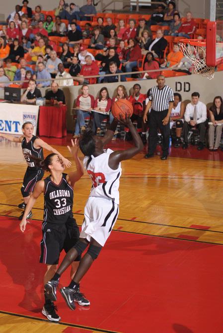 Zeinab Chan, junior history major, goes up for a shot in the Quarterfinals game of the NAIA National Tournament against Oklahoma Christian University. The Lady Bulldogs won 83-55. - Photo by Morris Abernathy