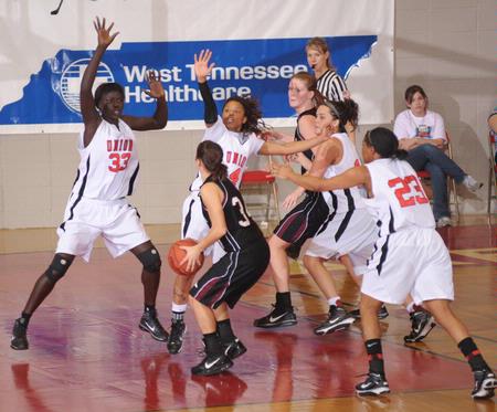 The Lady Bulldogs play defense against Oklahoma Christian University in the Quarterfinals game of the NAIA National Tournament. The Lady Bulldogs won 83-55. - Photo by Morris Abernathy