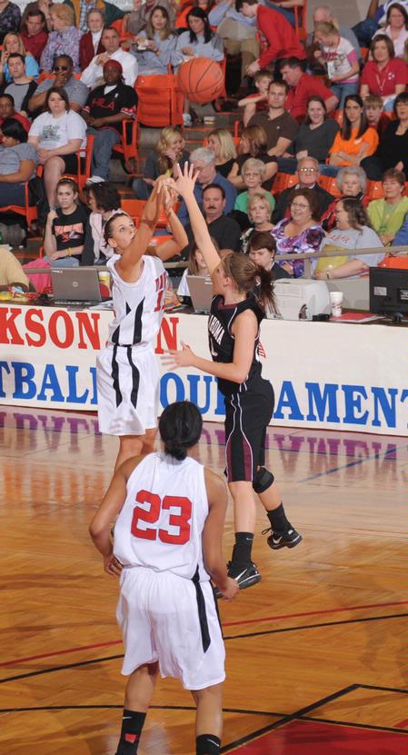 Kaitlin Dudley, senior physical education and health major, sinks a shot in the Quarterfinals game of the NAIA National Tournament against Oklahoma Christian University. The Lady Bulldogs won 83-55. - Photo by Morris Abernathy