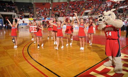 Buster the Bulldog joins the cheerleaders to cheer for the Lady Bulldogs during the Championship game of the NAIA National Tournament. - Photo by Morris Abernathy