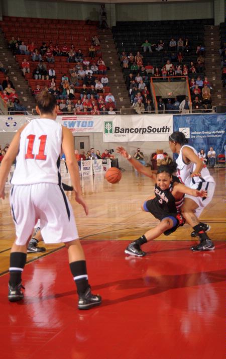The Lady Bulldogs play defense against Azusa Pacific University in the Championship game of the NAIA National Tournament. Union came out champions with a victory of 73-65 - Photo by Morris Abernathy