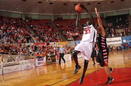 Zeinab Chan, junior history major, goes up for a layup against her Azusa Pacific University opponent in the Championship game of the NAIA National Tournament. The Lady Bulldogs won 73-65. - Photo by Morris Abernathy