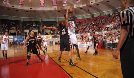 Zeinab Chan, junior history major, goes up for a shot in the Championship game of the NAIA National Tournament. The Lady Bulldogs defeated Azusa Pacific University 73-65. - Photo by Morris Abernathy
