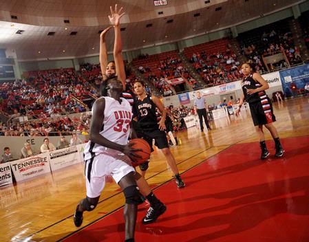 Zeinab Chan, junior history major, goes up for a shot in the Championship game of the NAIA National Tournament. The Lady Bulldogs defeated Azusa Pacific University 73-65. - Photo by Morris Abernathy