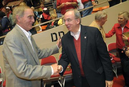 Mayor Jerry Gist congratulates Dr. David S. Dockery, president of Union University, after the Lady Bulldogs won the NAIA National Tournament.  - Photo by Morris Abernathy