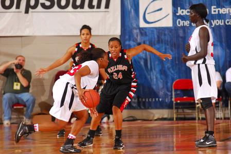 Lavanda Ross, sophomore accounting major, drives toward the basket during the Championship game of the NAIA National Tournament. The Lady Bulldogs defeated Azusa Pacific Univeristy 73-65. - Photo by Morris Abernathy