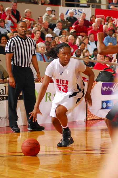 Lavanda Ross, sophomore accounting major, dribbles the ball down the court in the Championship game of the NAIA National Tournament. The Lady Bulldogs defeated Azusa Pacific University 73-65.  - Photo by Morris Abernathy