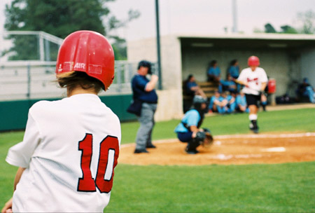 Junior pitcher, Leah Gronberg (10) prepares to bat. - Photo by Jim Veneman