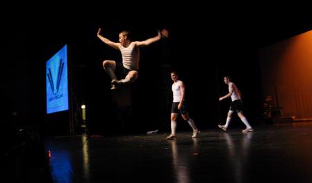 Jared Nolen, senior political science major, jumps into the air during a skit for Variety Show 2010. - Photo by Morris Abernathy