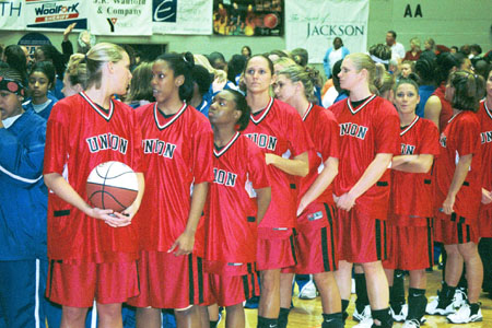 Union Lady Bulldogs in line during the NAIA National Tournament <i>Parade of Champions.</i>  Seniors Allison Harrison and Tashekia Brown are first in line. - Photo by Justin Veneman