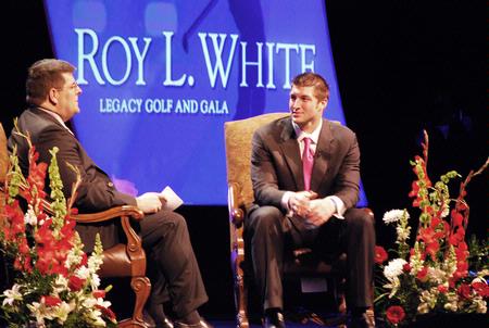 Dr. Charles Fowler asks Tim Tebow questions submitted by the audience after his speech at the Roy L. White Legacy Golf and Gala. - Photo by Abigail Harris