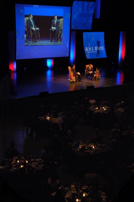 Dr. Charles Fowler asks Tim Tebow questions submitted by the audience after his speech at the Roy L. White Legacy Golf and Gala. - Photo by Lauren Laster