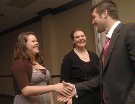 Tim Tebow greets Union students after speaking at the Roy L. White Legacy Golf and Gala, April 19. - Photo by Beth Spain
