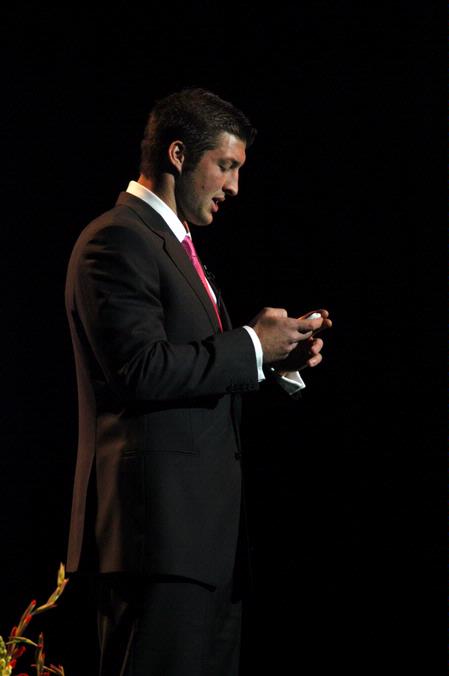 At the Roy L. White Golfing Gala, Tim Tebow shares a text message he received from a 10-year-old boy on Easter. The message is an example of what brings meaning to his life. - Photo by Beth Spain