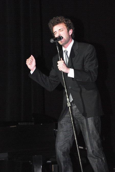 Josh Allen, senior Christian studies major, belts out a song at the 2010 Variety Show. - Photo by Abigail Harris
