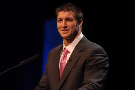 Tim Tebow speaks at the Roy L. White Legacy Golf and Gala event. - Photo by Morris Abernathy