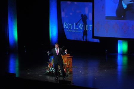 Tim Tebow speaks at the Roy L. White Legacy Golf and Gala event. - Photo by Morris Abernathy