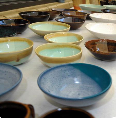 Pottery sits on display at the annual Mother's Day Pottery and Art Sale where art students have the opportunity to sell their work. - Photo by Morris Abernathy