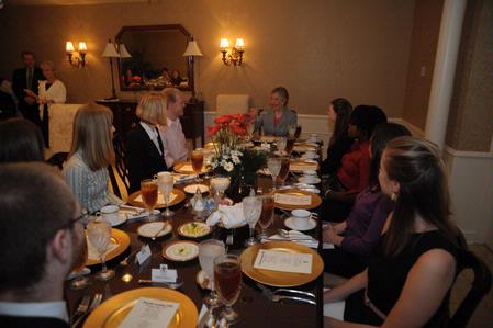 Mrs. Lanese Dockery, first lady of Union University, teaches students dinner-table etiquette. These skills are essential for lunch interviews that the students may encounter while on their job search.  - Photo by Morris Abernathy