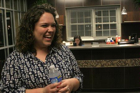 Amanda Davidson, junior nursing major, laughs with friends before the movie night hosted by the SAC. Student Activities Council hosts several movie showings per semester, usually outside on the lawn, weather permitting.  - Photo by Lauren Laster