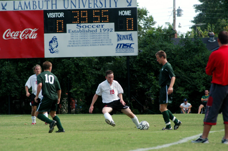 Gareth Munro (19) clears the ball as Christopher Printice (18) looks on for Union. - Photo by Jonathan Blair