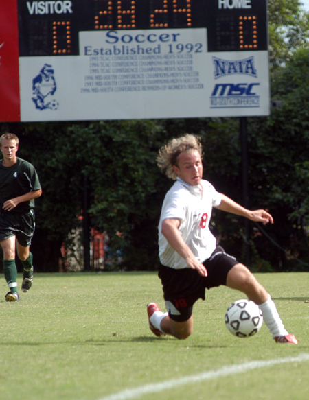 Christopher Prentice (18) attempts to get to the ball before it goes out of bounds.   - Photo by Jonathan Blair