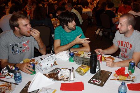 Graduating seniors Michael Grubb, Kevin Bradley, and Justin Hobbs talk over lunch at The Last Hurrah, a luncheon held in honor of graduating seniors.  - Photo by Ebbie Davis