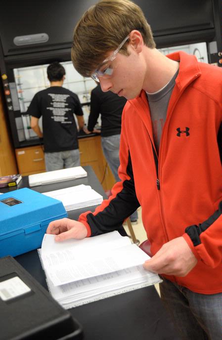 Students work on a chemistry lab assignment.  - Photo by Morris Abernathy