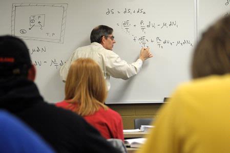 Dr. David Ward, professor of physics, teaches a class.  - Photo by Morris Abernathy