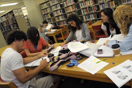Students meet for a study group in the library. - Photo by Morris Abernathy