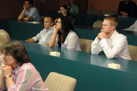Students listen as their classmates present projects as a part of the annual scholarship symposium. - Photo by Morris Abernathy